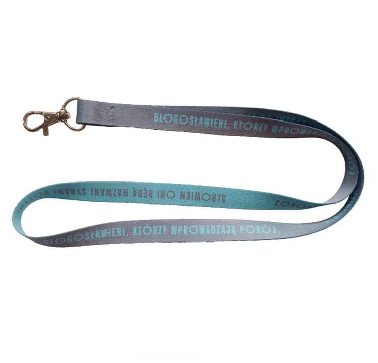 Smycz z cytatem „Błogosławieni, którzy wprowadzają pokój” (Mt 5,9) i symbolem Ducha Świętego – chrześcijański gadżet | sklep e-religijne.pl