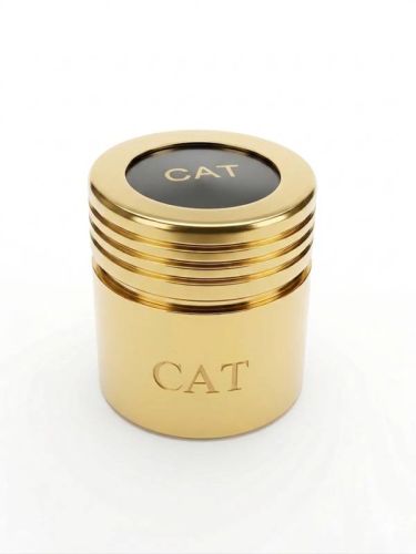Pojemnik na olej katechumenów CAT w kolorze złota, wysokość 4 cm, oznaczenie żłobione na ściance bocznej